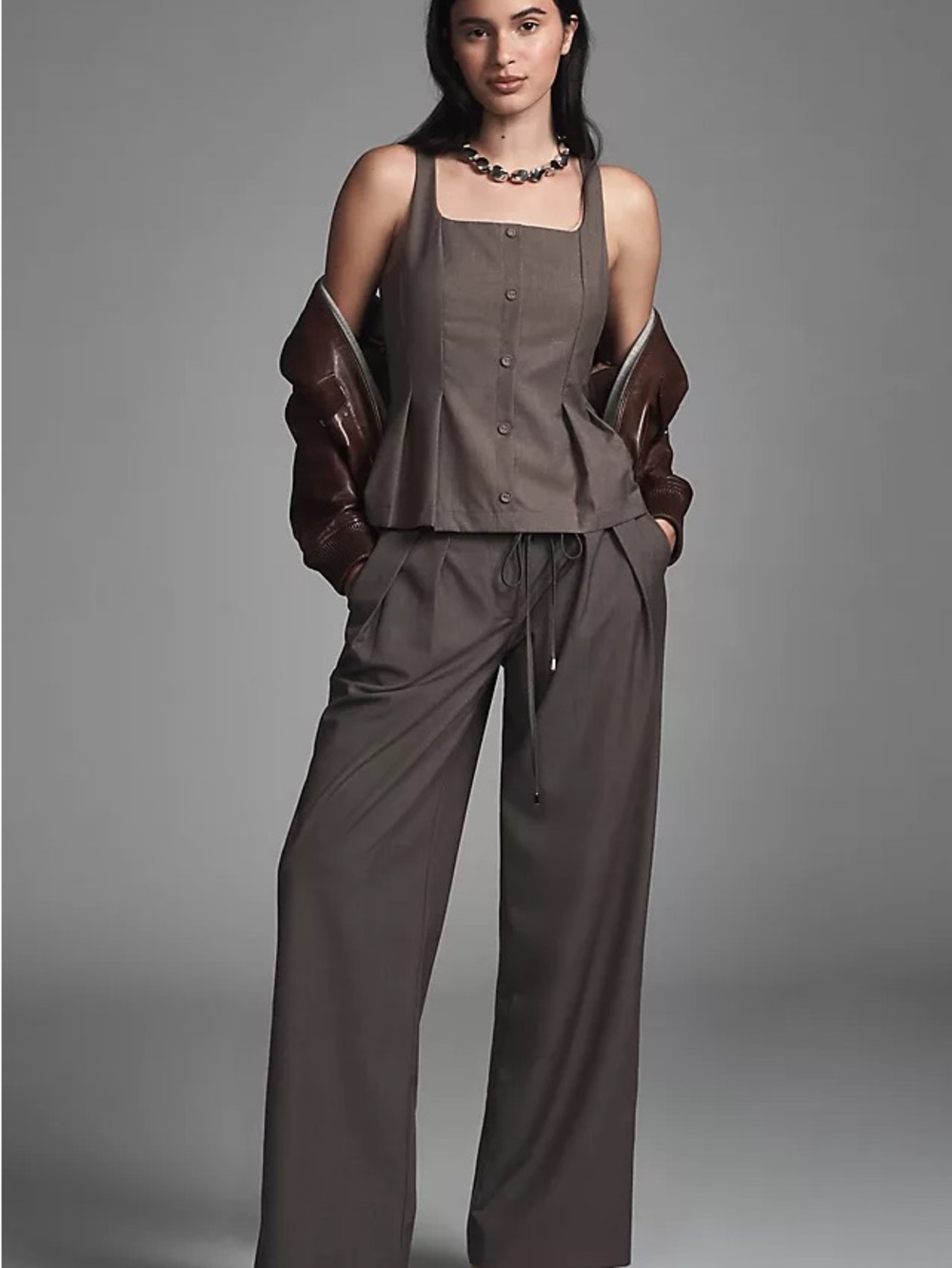 En Saison peplum pleated vest in grey